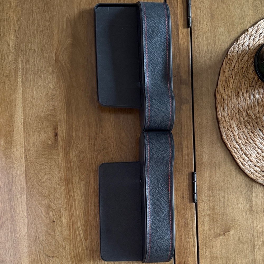 Black Car Armrest with Red Stitching